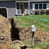 Residential sewer line replacement excavation in progress at a Clifton Park home